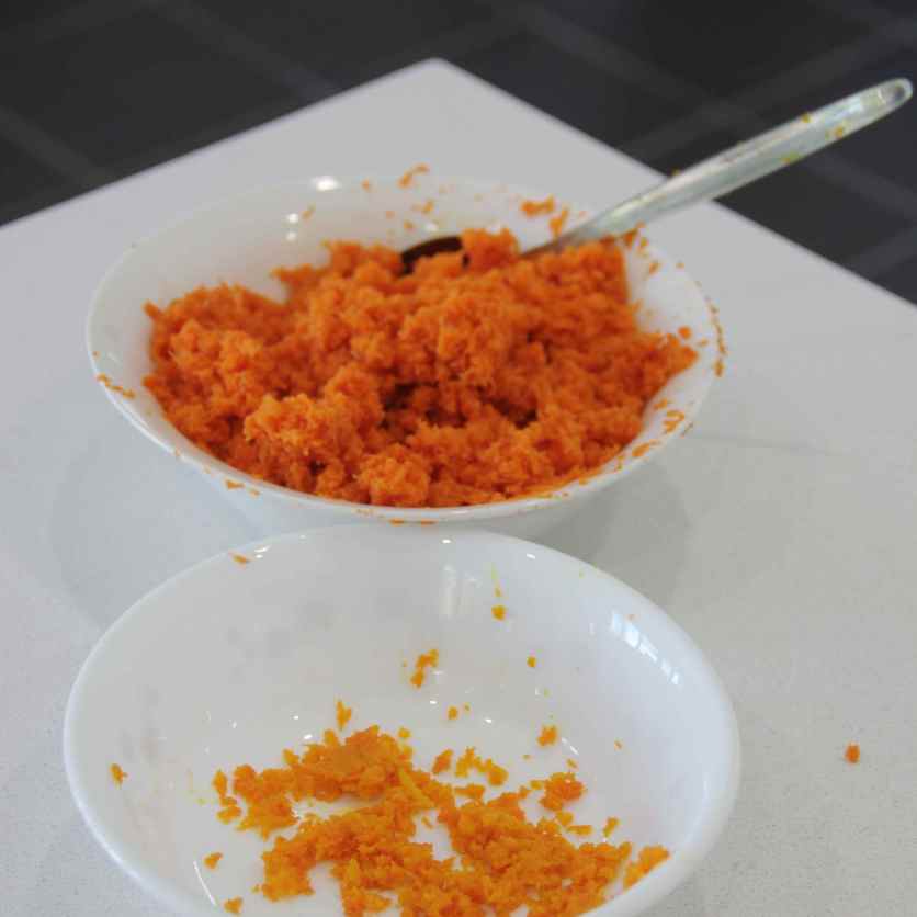 Grate 300g of carrots and zest 1 orange